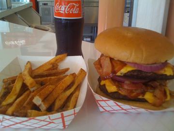 burger, fries, and a bottle of Coca-Cola