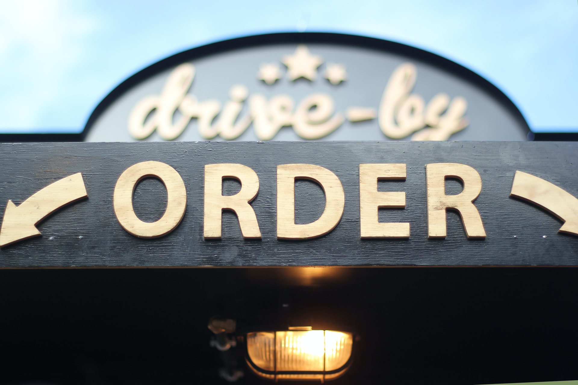 "drive by" and "order" building signs